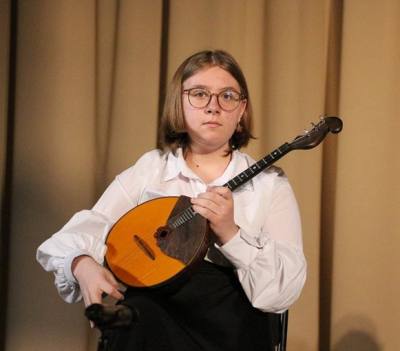 Очарованье струн певучих